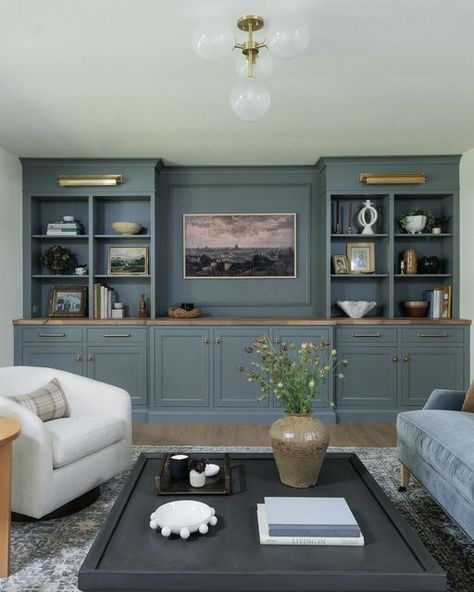 Jean Stoffer on Instagram: "The Living Room at our brick ranch project got a major upgrade with this wall of cabinetry from our Townhouse Collection @stofferhomecabinetry  in elegant Camden Grey. Check this line out if you have a more moderate budget. Same excellent quality and design, just limited choices, bells and whistles. And if you want to see the whole project check out Episode 4 of The Established Home!  Streaming on Max and Discovery+. ❤️" Living Room Built In Cabinets, Painted Built Ins, Stoffer Home, Built In Wall Units, Jean Stoffer, Family Lounge, Built In Entertainment Center, Built In Shelves Living Room, Living Room Built Ins