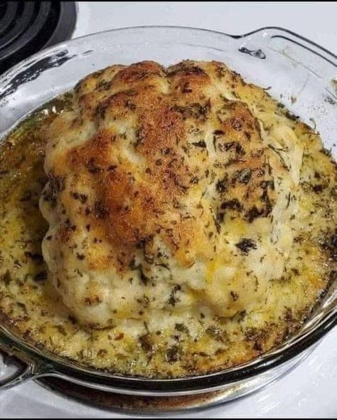 Baked Cauliflower BOMB!🔥🔥🔥 Get a head of cauliflower and cut off the hard pieces and stem but leave the head intact. Boil the cauliflower for 7 minutes, drain and pat dry. Mix 1 cup of mayonnaise, 1 cup of parmesean cheese, 1/2 cup white cheddar cheese, minced garlic, & dried parsley. Mix together and coat the cauliflower with the mixture. Sprinkle garlic powder and black pepper on it and more parsley. Bake in the oven 20 minutes Whole Roasted Cauliflower, Dried Parsley, Easy Cauliflower, Head Of Cauliflower, Baked Cauliflower, Easy Homemade Recipes, White Cheddar, Veggie Side Dishes, 7 Minutes