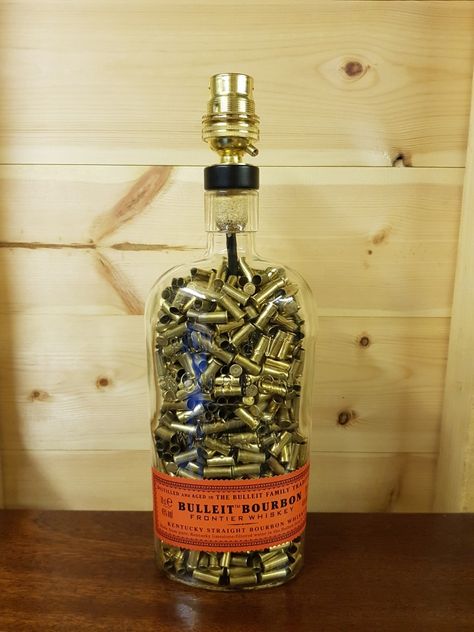 What To Do With Old Whiskey Bottles, Whisky Bottle Crafts, Whiskey Bottle Crafts Diy, Bourbon Bottle Crafts, Whiskey Bottle Crafts, Whiskey Bottle Lamp, Liquor Bottle Lights, Bullet Casing Crafts, Liquor Bottle Lamp