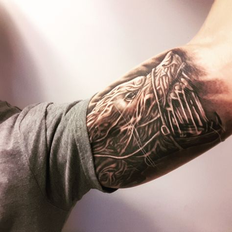 Fenrir Inner Biceps Tattoo. Male Bicep Tattoo Ideas, Viking Inner Bicep Tattoo, Inner Biceps Tattoo, Inner Bicep Tattoo Men Ideas Design, Inner Bicep Tattoo Men Ideas, Bicep Tattoo For Guys Inner, Inner Bicep Tattoo Men, Inside Bicep Tattoo Mens, Biceps Tattoo