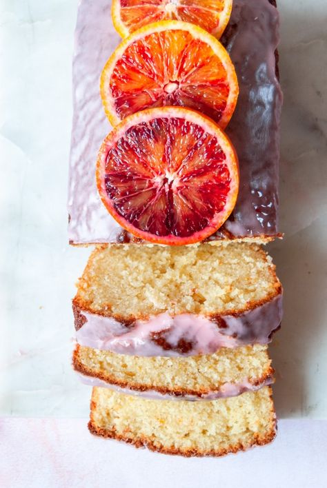 This delicious blood orange olive oil cake couldn’t be simpler to make – it’s so beautiful too! An ideal recipe for brightening up those dark, Winter days. Blood Orange Olive Oil Cake, Orange Loaf Cake, Orange Loaf, Orange Olive Oil Cake, Orange Icing, Orange Glaze, Oil Cake, Olive Oil Cake, Loaf Cake