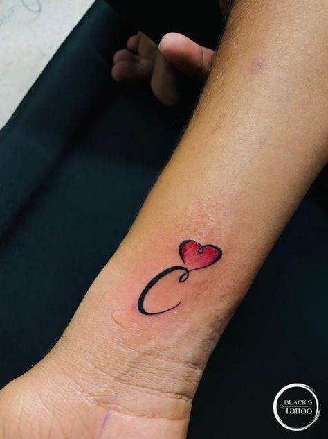 #black9tattoo Letter C Tattoo Ideas Initials, C Tatoos Letter, C Letter Tattoo Design, C Heart Tattoo, C Tattoo Initial, C Letter Tattoo, C Initial Tattoo, Heart Tattoo Simple, Letters Sketch