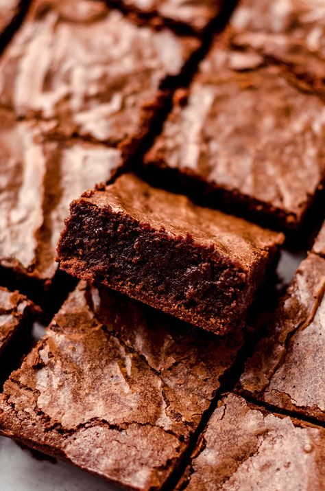 These dense and fudgy from-scratch brownies are made with melted chocolate and without cocoa powder for a perfectly crackly top– ditch the box forever! Scratch Brownies, Brownies Chewy, Cheesecake Swirl Brownies, Easy Chocolate Mousse, Food Reference, Chocolate Fudge Frosting, Chocolate Chip Cheesecake, Fudge Frosting, Brownie Ingredients