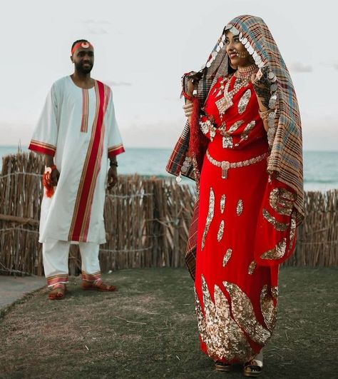 An original version of the most distinctive traditions, habits, customs, and lifestyles can be found created by the Nubians, and one distinctive tradition of them is the "Nubia Marriage”. The Nubian Marriage is way more distinguished from the weddings that nowadays are conducted in Egypt. For the Nubians, the celebration continues for 7 days, in a span, for the bride alongside 7 days for the groom. #EgyptToursPortal #nubianvillage #culture #Nubia #history #nubianpeople #EgyptianCulture Sudanese Clothing, Nubian Village, Egyptian Wedding, Nubian Heritage, Male Outfits, Cultures Around The World, Egypt Tours, Culture Clothing, Egyptian Culture