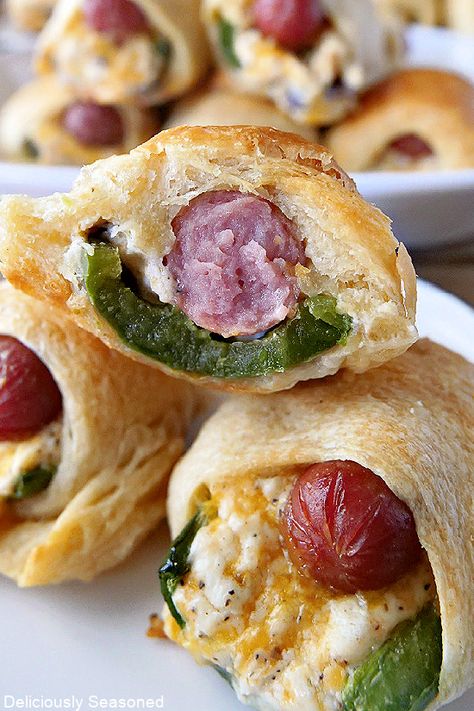 Jalapeno Popper Pigs in a Blanket are two delicious favorites in one, jalapeno poppers and pigs in a blanket. The Ultimate party food! Popper Pigs In A Blanket, Breakfast And Brunch, Jalapeno Popper, Party Dips, Pigs In A Blanket, Favorite Appetizers, Football Food, Finger Food Appetizers, Jalapeno Poppers