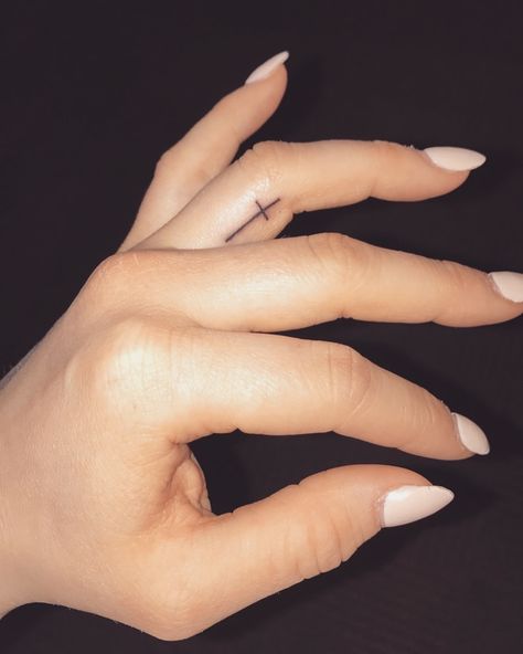 Small Inner Finger Tattoos For Women, Finger Tattoos For Women Inner, Cross On Inside Of Finger, Lil Finger Tattoos, Finger Tattoos On The Side, Small Cross Finger Tattoo, Wife Finger Tattoo, Cross Ring Finger Tattoo, Small Cross Finger Tattoos For Women