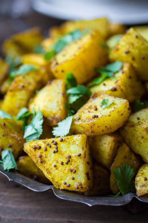 Bombay Potatoes: Crispy on the outside, fluffy on the inside, and richly spiced with Indian flavors -- Bombay Potatoes are the perfect side dish for any Indian meal! Bombay Potato Recipe, Bombay Potatoes, Vegetarian Curry, Homemade Drinks, Recipes To Try, Indian Dishes, Perfect Side Dish, Dinner Tonight, Potato Recipes