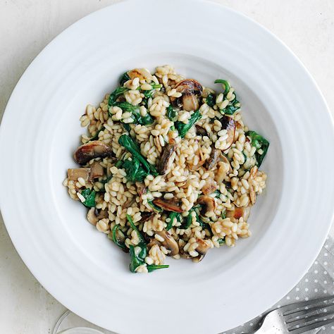 Looking to make a great meal without cooking a ton? Our Mushroom and spinach risotto recipe is perfectly portioned for one and simple to make. Spinach Risotto, Spinach And Mushroom, Mushroom Spinach, Vegetable Stock Cubes, Risotto Recipe, Arborio Rice, Mushroom Risotto, Risotto Recipes, Vegetable Stock