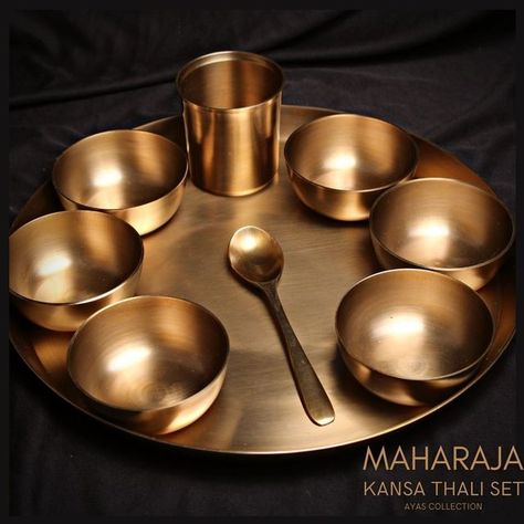 Codesustain ® on Instagram: "AUTHENTIC ,SUSTAINABLE,LUXURIOUS & GLAMOROUS DINNERWARE SET  Ayurveda has termed the Kansa as the ‘healing metal.’ The reason being it embraces nutritive and hygiene values. Kansyam Buddhivardhakam, a Sanskrit saying translates into Kansa sharpens our intellect.  If you’re thinking of giving your table setting a decorative touch, take a look at our vast range of expertly.  Handcrafted Sustainable Ethically Sourced  Check out Ayās Collection ------------------- www.codesustain.in --------------------------------  Shop now at www.codesustain.in  .. . . . . . . . .  #sustainableshopping #dinner #thaliset #ptal #kansa #sustainableliving #sustainability #sustainable #kitchenware #cookware #codesustain #kansaware #tableware #dinnerware #dinnersets #royalty #sustainab Oro Aesthetic, Indian Dinnerware, Arti Thali, Kitchen Redesign, Woodworking Furniture Plans, Kitchen Accessories Decor, Luxury Dinnerware, Sustainable Shopping, Silver Collection