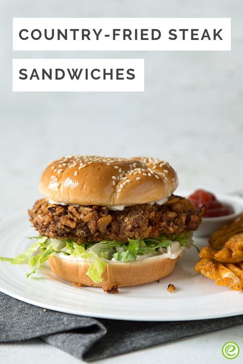 Country-Fried Steak Sandwiches | eMeals.com Country Fried Steak Sandwich Recipe, Chicken Fried Steak Sandwich Recipe, Chicken Fried Steak Sandwich, Country Fried Steak Sandwich, Healthy Country Fried Steak, Steak Frites Sandwich, Chicken Fried Hamburger Steak, Kent Rollins Chicken Fried Steak, Steak Sandwich Recipes