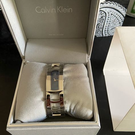 New, In Box. Silver With Blue Face. Cuff Or Bracelet Style. Calvin Klein Watch, Minimal Watch, Ruby Rox, Silver Watches Women, Blue Face, Bangle Watches, Grey Booties, Bracelet Style, Watches Unique