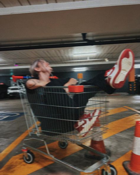 Blurry girl in shopping cart wearing red Nike Jordan’s. Grunge aesthetic Shopping Trolley Aesthetic, Trolley Aesthetic, Aesthetic Shopping, Grad Photography, Shopping Trolley, Add To Cart, Insta Photo Ideas, Making Memories, Insta Photo