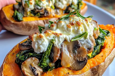 Enjoy these delicious stuffed sweet potatoes filled with spinach, mushrooms, feta, and rosemary. A nutritious and satisfying dish perfect for any meal. Mediterranean Sweet Potatoes, Potatoes With Spinach, Stuffed Sweet Potato, Feta Cheese Recipes, Stuffed Sweet Potatoes, Spinach Mushroom, Sweet Potato Spinach, Beet Recipes, Potato Recipes Side Dishes