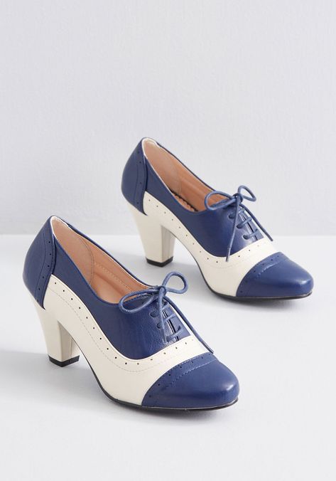 Plans to Dance Oxford Heel - These navy blue heels make your intentions clear - you're headed for the dance hall! With cream accent colors, tasteful perforations, lace-up closures, and tapered heels, this faux-leather footwear makes your entire look swingy and sweet. 1950s Fashion Shoes, Art Deco Shoes, 1940s Shoes, Navy Blue Heels, Vintage Style Shoes, Glamour Vintage, Saddle Shoes, Prom Heels, Lauren Bacall