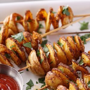 Baked potatoes have never been this showy before! Skewer and spiral small potatoes and bake for a side dish that's fun to make and eat. Spiral Potatoes Baked, Spiraled Potatoes, Spiral Potatoes On A Stick, Spiralized Potatoes, Spiral Potatoes, Tornado Potatoes, Tornado Recipe, Spiral Potato, Tornado Potato