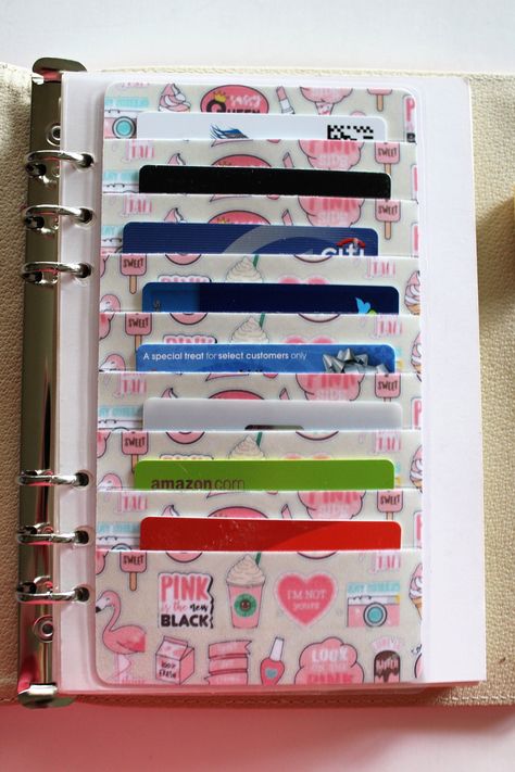 "Listing Includes: One Planner Credit Card Holder FEATURES: Laminated with 5ml lamination for durability Printed on card stock paper Same Print on Back SIZE: (approx.) A5: 5\" wide x 8.25\" tall (includes lamination) Hole Punched for standard 6 ring A5 Planner Holds 8 Cards MINI HAPPY PLANNER: Holds 7 Cards DESIGNED FOR ONE CARD ONLY PER SLOT SIZE: (approx.) 4.75\" wide x 7\" tall (includes lamination) Disc punched for Happy Planner Mini (7holes) Made by me in my smoke free studio" Happy Planner Storage, Kate Spade Planner Organization, Money Saving Methods, Recollections Planner, Planner Obsessed, Mini Happy Planner, Money Saving Strategies, Gold Hearts, A5 Planner