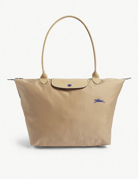 Longchamp Le Pliage Club, Chinese English, Iconic Bags, The Minimalist, 70th Birthday, Longchamp Le Pliage, Easy Storage, Metal Hardware, Handles