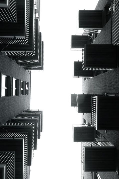 Photo by Juhasz Imre. Check out Juhasz's profile: https://www.pexels.com/u/juhasz-imre-106219/ #city #buildings #architecture Angle Photography, Black And White Building, Building Aesthetic, Building Photography, Buildings Photography, Black And White City, Apartment Architecture, Low Angle, High Rise Building