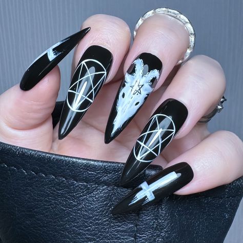 The Core Collection Unleash your dark side with a white hand painted Baphomet inspired design on a black background! Purchase includes; 10 x Apres Gel X Soft Gel Cover Tips 1 x Sizing Kit*1 x Application Kit (Nail File, Cuticle Pusher & Nail Glue OR Adhesive Tabs) See All from Collection: The Core Collection → Long Goth Acrylic Nails, 666 Nails Designs, Goth Coffin Acrylic Nails, Baphomet Nails, Cute Nails Grunge, Short Stilleto Nails Acrylics, Ouija Nail Art, Gothic Holiday Nails, Pagan Yule Nails