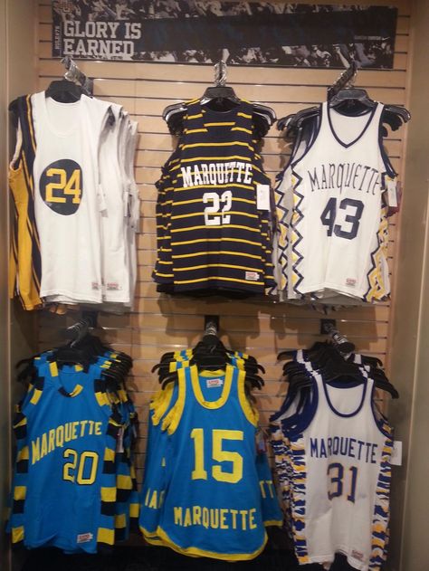 Throwback Marquette Basketball jerseys now available at the Marquette Spirit Shop. Stop in or call 414-288-3050 to order. Marquette Basketball, School Spirit Ideas, Ncaa Basketball Jersey, Marquette University, Gameday Outfits, Warriors Basketball, Sports Team Logos, Ncaa Basketball, Basketball Jerseys