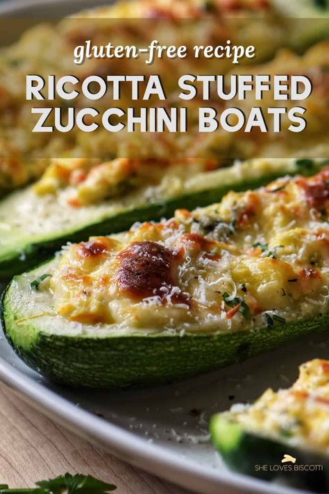 This Ricotta-Stuffed Zucchini recipe skips the bread crumbs, but you won’t even miss them! The combination of creamy ricotta, mozzarella, and Romano creates a rich and satisfying filling that’s perfectly complemented by the tender zucchini. Cheese Stuffed Zucchini Boats, Gluten Free Zucchini Boats, Mexican Stuffed Zucchini Boats, Stuffed Zucchini Boats With Ricotta, Ricotta Savory Recipes, Spinach Mushroom And Ricotta Stuffed Zucchini Boats, Ricotta Stuffed Zucchini Boats, Zucchini And Ricotta Recipes, Spinach Mushroom Ricotta Zucchini Boats