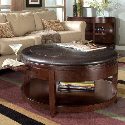 Magnussen T1096-45 Newark Wood Round Coffee Table - Liven up your living room with the convenience of this Magnussen T1096-45 Newark Wood Round Coffee Table doubling as a coffee table and a cocktail tab... Man Cave Coffee Table, Padded Coffee Table, Round Ottoman Coffee Table, Round Leather Ottoman, Leather Ottoman Coffee Table, Types Of Coffee Tables, Oversized Coffee Table, Storage Ottoman Coffee Table, Leather Coffee Table