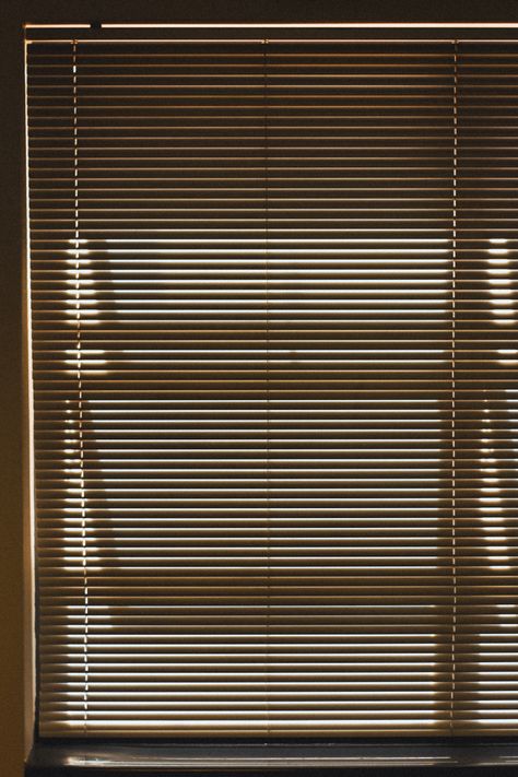 This is a photo taken of window frames casting a shadow onto the blinds in from of them. This causes an intersting textured effect which is aesthetically pleasing Window Blinds Shadow, Light Photography Aesthetic, Blinds Shadow, Looking Through Window, Contrast Texture, 2 Aesthetic, Blinds Window, Light Shadow, Photography Aesthetic