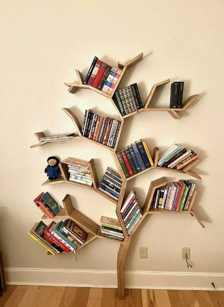 The Best Tree Bookshelves - BOOKGLOW Wooden Tree Bookshelf, Wooden Library Design, Diy Tree Bookshelf Plans, Bookshelves Tree, Tree Bookshelf Diy, Book Tree Shelf, Diy Tree Bookshelf, Tree Bookshelves, Good Reading Books