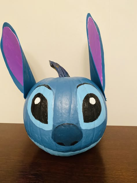 Disney’s Lilo & Stitch painted pumpkin Disney Pumpkin Painting, Story Book Pumpkin, Halloween Pumpkin Crafts, Creative Pumpkin Painting, Creative Pumpkin Decorating, Character Pumpkins, Pumpkin Decorating Contest, Halloween Decor Diy, Disney Pumpkin