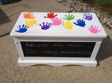 Handprint toy box.  I used chalkboard paint for the front:) Toy Box Paint Ideas, Toy Box Painting Ideas, Painted Toy Box Ideas, Box Paint Ideas, Painted Toy Chest, Painted Toy Boxes, School Auction Art Projects, School Auction Projects, Art Auction Projects