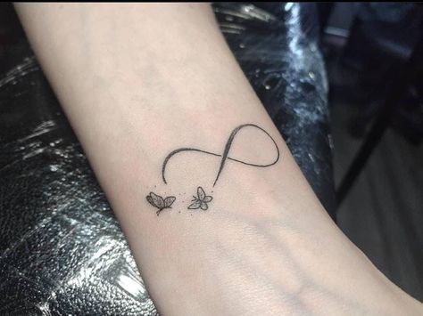 Butterfly And Infinity Tattoo, Infinity Tattoo With Butterfly, Infinity Butterfly Tattoo For Women, Tattoos For Women Small Wrist, Tattoos For Women Wrist, Infinity Butterfly Tattoo, Women Wrist Tattoos, Pearl Jam Tattoo, Dainty Tattoos For Women