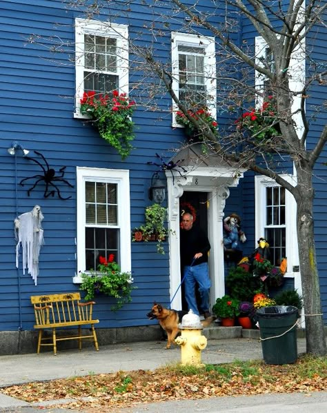 I am pretty sure if I ever build a house it will be blue with a yellow door. I also LOVE the pops of red. Benjamin Moore Newburyport Blue, Newburyport Blue, Blue Home Exterior, Yellow Window, Home Exterior Paint, Blue Houses, Cottage Exteriors, Exterior House Color, Exterior House Paint