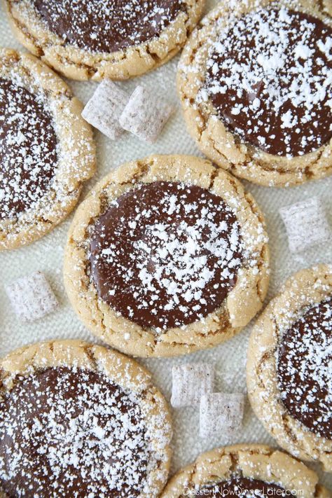 Muddy Buddy Cookies are the ultimate peanut butter chocolate cookies! Soft peanut butter cookies are topped with creamy melted chocolate and a sprinkle of powdered sugar. All the flavors of your favorite muddy buddies Chex mix in the form of a cookie. Muddy Buddy Cookies, Microwave Chocolate Chip Cookie, Peanut Butter Blossoms Recipe, Thumbprint Cookie, Muddy Buddy, Soft Peanut Butter Cookies, Butter Pecan Cookies, Classic Cookies Recipes, Crumbl Cookies