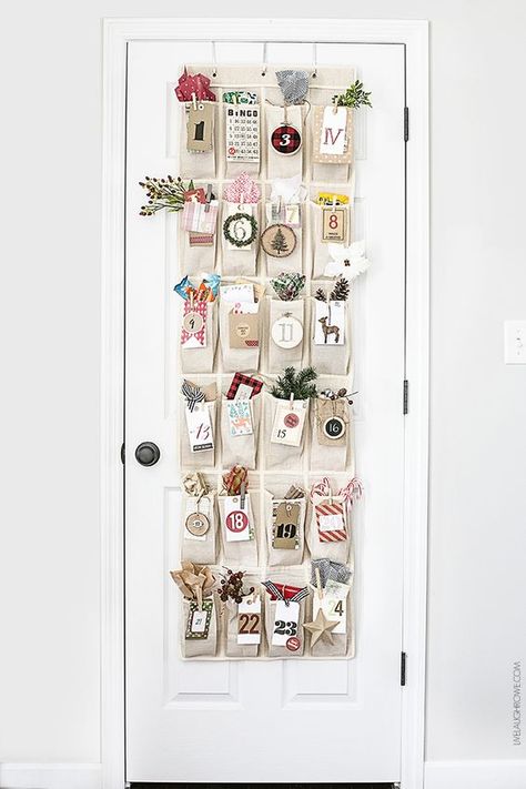 Homemade Advent Calendars For Kids. Woodland inspired advent calendar hanging from white wooden door. Homemade Calendar, Homemade Advent Calendars, Christmas Advent Calendar Diy, Printable Advent Calendar, Advent Calendars For Kids, Advent Calenders, Diy Advent Calendar, Calendar Gifts, Kids Calendar