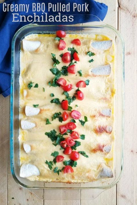 These enchiladas are a perfect way to turn leftover pulled pork into something completely different. They have the perfect mix of smoky bbq flavored pulled pork and fixins for the filling. Then they are smothered in a sour cream and cheese sauce that is out of this world.  You will find yourself making pulled pork just to make these enchiladas and I wouldn't blame you one bit. They are one of our favorites! Pulled Pork Leftover Recipes, Pulled Pork Enchiladas, Leftover Pulled Pork, Pork Enchiladas, Braised Pork Shoulder, Cream Cheese Sauce, Pulled Pork Leftovers, Leftover Pork, Pork Dinner