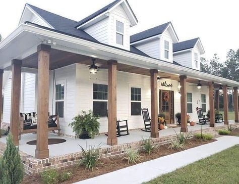 Wood Beams Outside Of House, Country Ranch Style Homes Farmhouse Wrap Around Porches, L Shape Porch Ideas, White House Black Windows Wood Accents, White Farmhouse With Shutters, Small Farmhouse Exterior Ideas, Remodel Front Of House, White Rustic House Exterior, White And Black House With Wood Accents