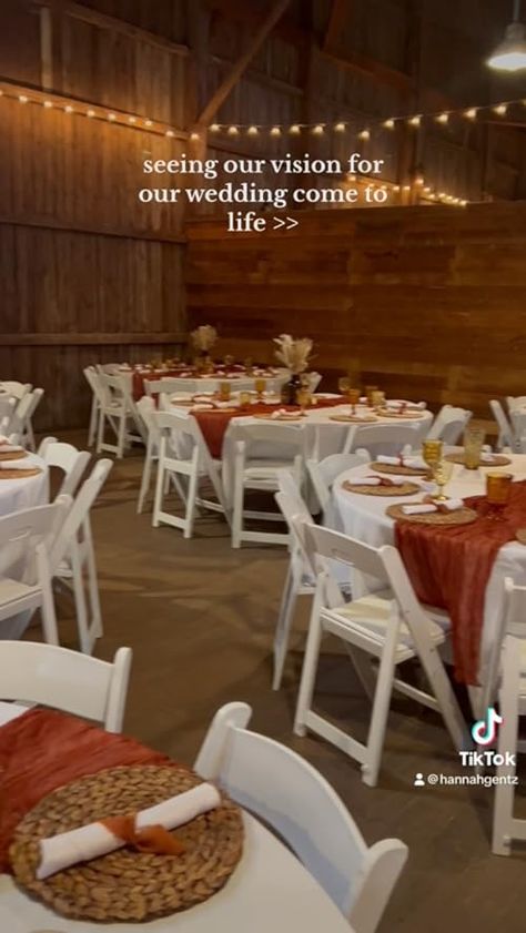 Wedding Table Decor Fall Rust Terracotta Cinnamon Wedding Decor For Round Tables, Wedding Table Decor Fall, Cinnamon Wedding, Fall Wedding Reception Tables, Fall Wedding Reception, White Folding Chairs, Autumn Wedding Reception, Wedding Table Linens, Reception Tables