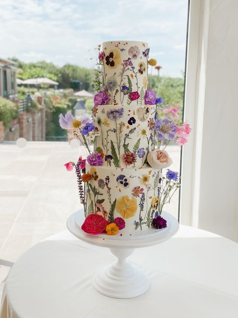 wildflower wedding cake in bright bold colours. Old Hall Ely wedding cake. pressed flower wedding cake design. edible flowers. Pressed Flower Wedding, Wildflower Cake, Debut Theme, Flower Wedding Cake, Edible Flowers Cake, Wedding Cake Display, Fresh Flower Cake, Floral Wedding Cake, Floral Wedding Cakes