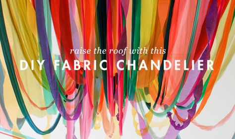 Raise the roof with this DIY fabric chandelier. Chandelier Cover Diy, Fabric Chandelier Diy, Streamer Chandelier Diy, Fabric On The Ceiling, Diy Light Chandelier, Crayon Chandelier, Ribbon Chandelier Diy, Diy Hanging Chandelier, Diy Fringe Chandelier