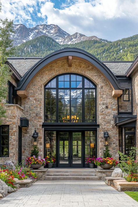 Grand stone entrance with stunning mountain backdrop. From rustic mountain retreats to urban lofts with views worth a million bucks (or maybe we’re just out of breath from the altitude), Colorado homes have their very own kind of charm. Stone Entrance, Colorado Mountain Homes, Peace Home, Courtyard Landscaping, Stone Chimney, Montana Homes, Timber Architecture, Spring House, Mountain Backdrop