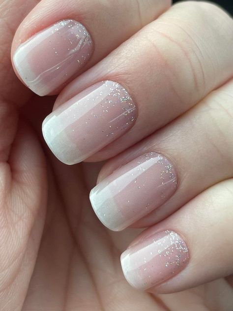 Our In the-Mood-for-Love semi cured gel nail stickers features a beautiful ombre effect with a mix of delicate pink and white hues. This signature style is our best-seller and suitable for everyone, adding a touch of timeless elegance to any occasion.Whether you're heading out for a romantic dinner, a night out with friends, or simply want to add a touch of glamour to your everyday look, or don't know where to start, our In the Mood for Love nail stickers is the perfect choice. Glitter Tip French Manicure, Sheer Glitter Nails, Ombre Sparkle Nails, Pink Ombre Nails Glitter, Sparkle French Manicure, Ombre French Tip, French Tip Gel, Ombre French Nails, Ombre French Tips