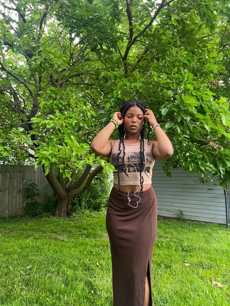 Earthy black girl long skirt aesthetic graphic tees nature girly pop m.bbyx core erykah badu core boho black girl inspo earthy vibes Graphic Tee Long Skirt, Long Skirt Aesthetic, Earthy Fits, Green Skirt Outfits, Senior Year Outfits, Aesthetic Graphic Tees, Earthy Fashion, Dark Green Skirt, Soul Vibes