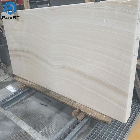 Corian White Onyx Countertop, Onyx Brand Countertops, White Marble With Brown Veins, Brown Vein Marble, Polished Onyx Marble, Cabin Bathrooms, Montana Homes, Tiles Price, Marble Flooring