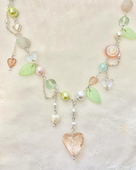 fairy heart necklace 🩷 $17 ~ ~ #jewelry #smallbusiness #necklace #necklaces #cute #fairy #fairycore #fairyaesthetic #cottagecore #cottagecoreaesthetic #dreamyaesthetic #cutejewelry #silver #silverjewelry #indie #boho #y2k #pink #butterfly Necklaces Cute, Fairy Heart, Forest Necklace, Dreamy Aesthetic, Handmade Fairy, Strawberry Charm, Heart Decals, Boho Y2k, Cottagecore Fairy