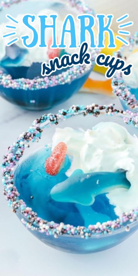 GUMMY SHARK JELL-O CUPS - Kids will devour this adorable gummy shark jello cup dessert snack at the next ocean themed birthday party or Shark Week celebration. It’s a fun and easy recipe idea that will spark creativity and imagination of days at the beach or a big pirate story! Shark Jello Cups, Shark Jello, Gummy Shark, Shark Snacks, Chicken Party, Birthday Movie, Shark Week Party, Jello Cups, Flamingo Costume