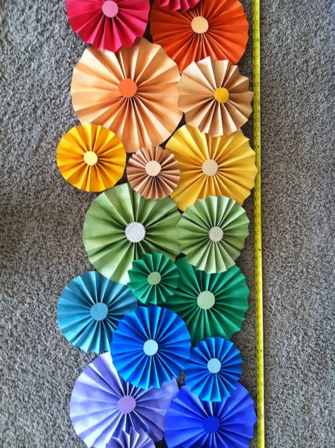 Paper folded flowers for March bulletin board Paper Flowers Bulletin Board, Flowers Bulletin Board, Notice Board Decoration, Folded Flowers, Craft Paper Flowers, March Bulletin Board, Art Bulletin Boards, Diy Bulletin Board, Bulletin Board Paper