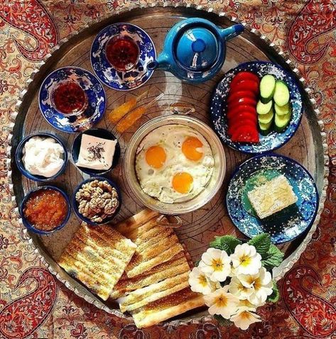 Persian Food + Persian Breakfast They say breakfast is the most important meal of the day, and Iranians don’t take this lightly. From the types of bread, to the heavy meat dishes and tea etiquette, we break down how to eat breakfast like an Iranian to help you fit right in with the locals.! Persian Breakfast, Arabic Breakfast, Persian Food Iranian Cuisine, Iranian Cuisine, Iran Food, Different Types Of Food, Breakfast Platter, Persian Cuisine, Iranian Food