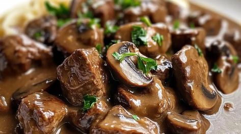 Beef tips with mushroom gravy is the ultimate comfort food, offering rich, savory flavors and melt-in-your-mouth tenderness in every bite. This dish combines perfectly seared beef tips with a ... Read more Beef And Mushroom Recipes, Beef Tips And Mushroom Gravy, Beef Tips Noodles, Beef Tips With Mushroom Gravy, Beef And Mushroom Recipe, Crockpot Beef Tips, Beef Tips And Noodles, Beef Tips And Gravy, Brown Gravy Mix