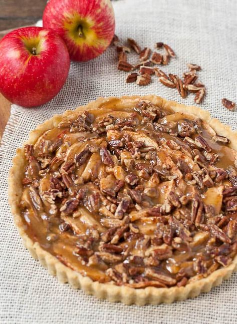 Salted Maple Caramel Apple Tart | NeighborFood Caramel Apple Tart, Holiday Tarts, Pecan Tart, Maple Caramel, French Apple Tart, Pecan Tarts, Coconut Dessert, Scoop Of Ice Cream, Brownie Desserts