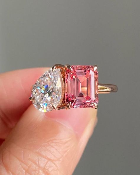 14KT Pear & Pink Emerald Diamond Toi et Moi Ring 2 Stone Moissanite Engagement Ring Birthstone Anniversary Ring Moissanite Toi et Moi Ring ✥ 𝐌𝐚𝐢𝐧 𝐒𝐭𝐨𝐧𝐞 𝐃𝐞𝐭𝐚𝐢𝐥𝐬 ↣ Shape: Pear Cut ↣ Type: Moissanite/CZ ↣ Weight: 3.00Carat (App.) ↣ Dimension: 10*8 MM (App.) ↣ Color: Colorless ↣ Clarity: VVS1 ↣ Making Process: Handmade - Crafted by our experienced team ✥ 𝐒𝐢𝐝𝐞 𝐒𝐭𝐨𝐧𝐞 𝐃𝐞𝐭𝐚𝐢𝐥𝐬 ↣ Shape: Emerald Cut ↣ Type: Moissanite/CZ ↣ Weight: 3.00Carat (App.) ↣ Dimension: 10*8 MM (App.) ↣ Color: Pink Diamond ↣ Clarity: AAA+ ↣ Options: Lab Grown Diamond and Natural Diamond (Possible on request while placing an order and Extra Chargeable Service) ✥ 𝐑𝐢𝐧𝐠 𝐃𝐞𝐭𝐚𝐢𝐥𝐬 ↣ Band Width: 1.4mm (± 0.10) [Customization Possible] ↣ Metal Purity: Solid Gold (10KT, 14KT, 18KT); Silver (92 Pink Rings, Emerald Engagement Ring Green, Pear Shaped Diamond Ring, Moissanite Engagement Ring Rose Gold, Pink Emerald, Emerald Cut Diamond Ring, Wedding Ring For Her, Pear Shaped Engagement Rings, Stone Wedding